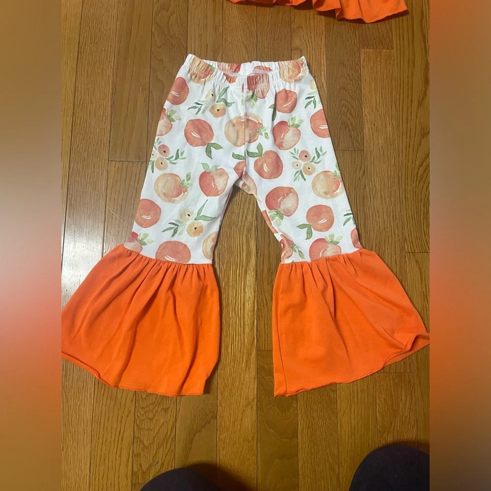 Orange Ruffle Top and peach Print‎ Pants with flare Set 3T